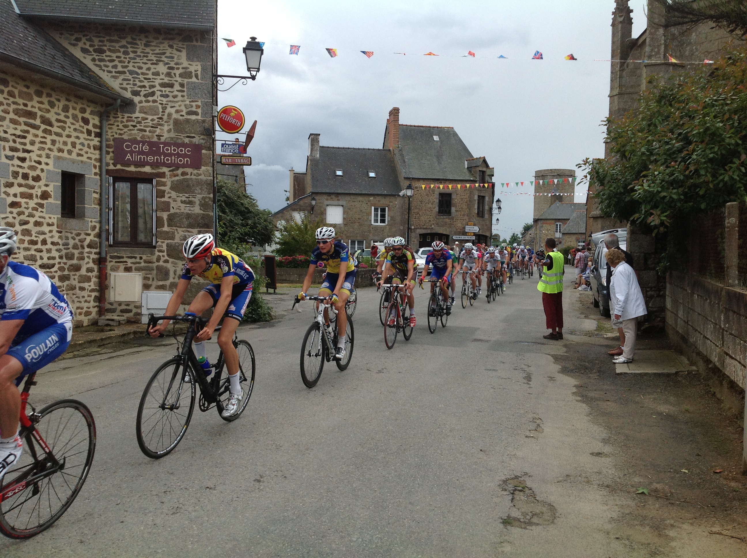 bicycle race going through village