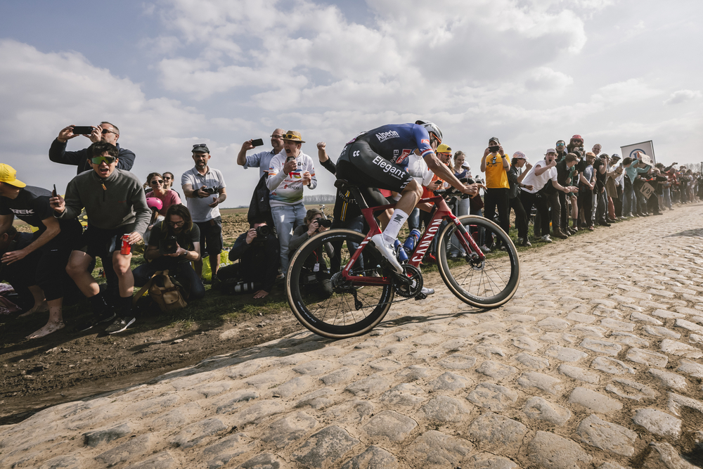 Photo of Mathieu Van Der Poel racing the Paris-Roubaix 2023